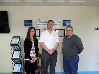 photograph of Kristen Macemore, Chair of Business and Technologies, Zachary Parker and Gary Daemer, President Infusion Points